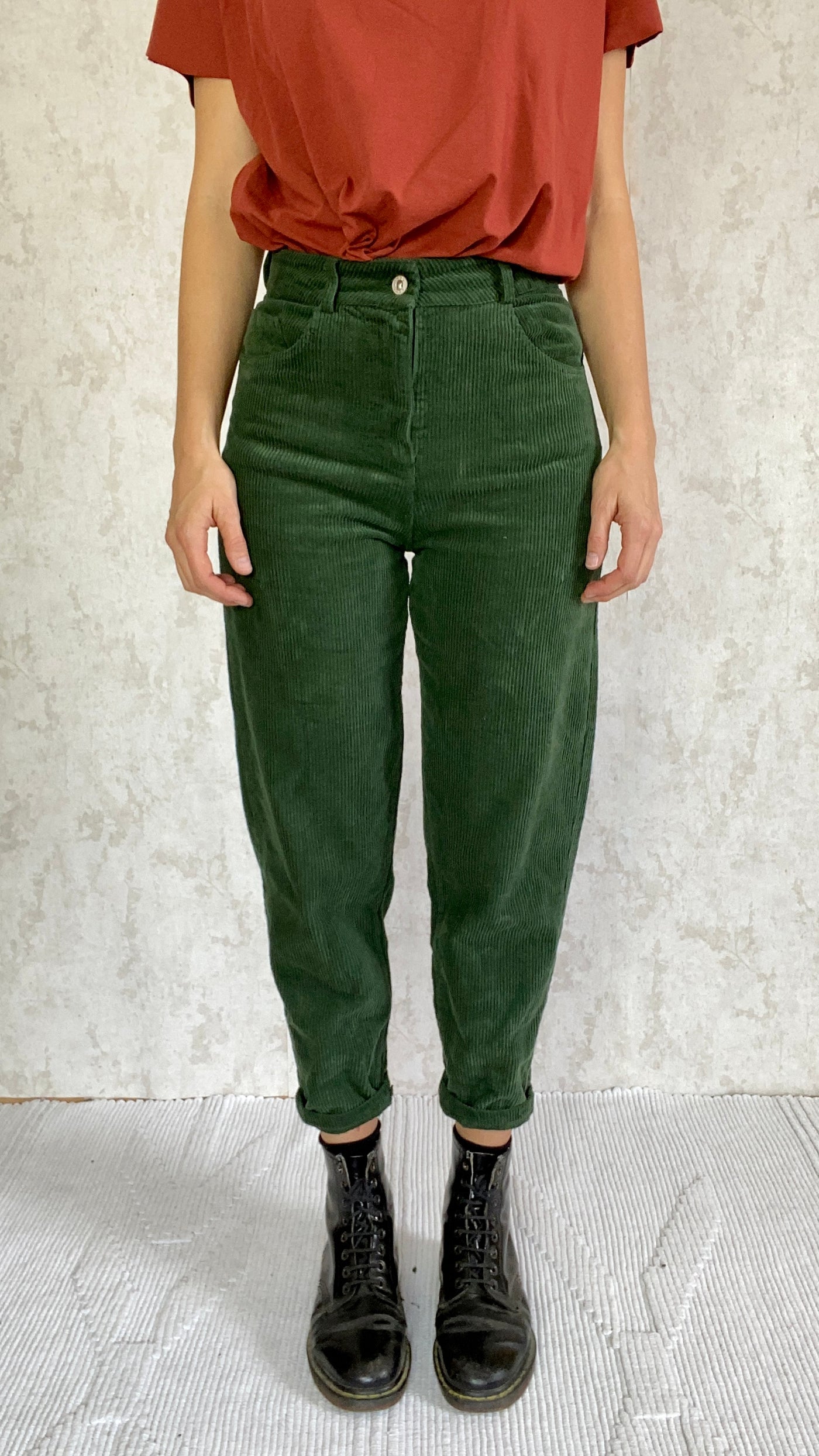 A woman wearing Cordhose retro 1990 made in Italy pants.