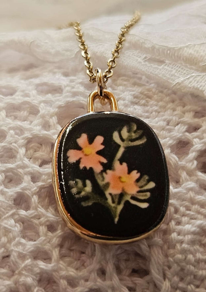 Dirndlkette schwarz mit Blumen