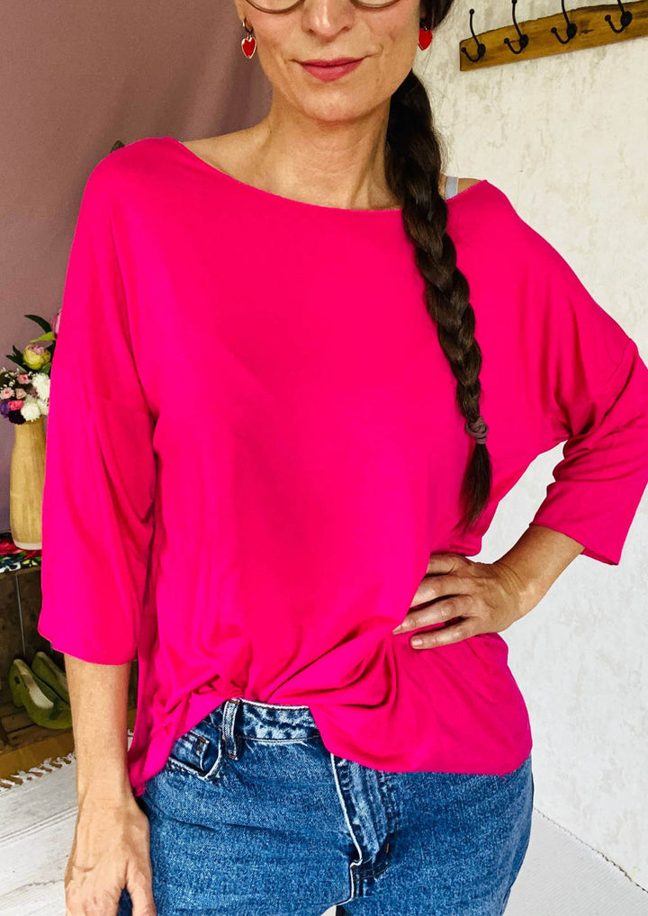 Pinkes Shirt mit weiten Ausschnitt