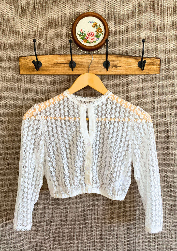 Dirndlbluse Rauti mit floralen Mustern, kleinen Rauten und feinen Streifen