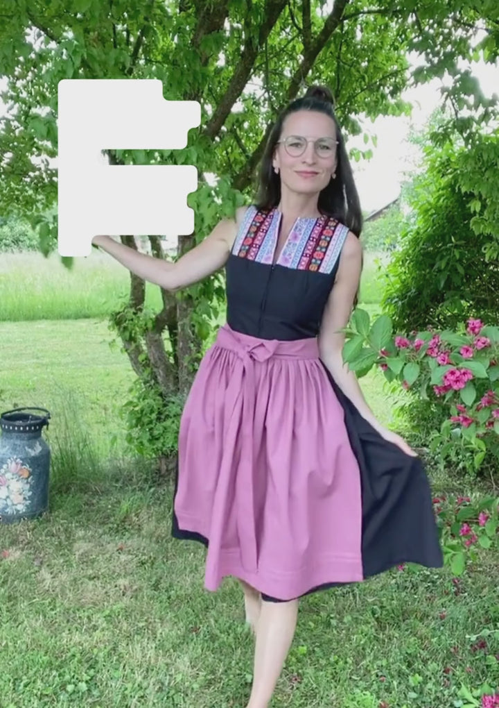 Dirndl schwarz mit bunten Bändern