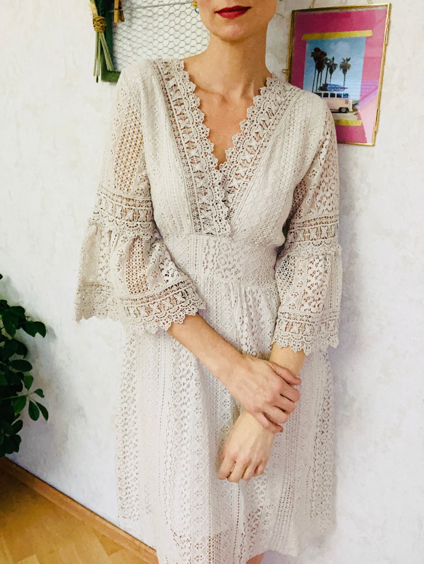 Lace dress with trumpet sleeves
