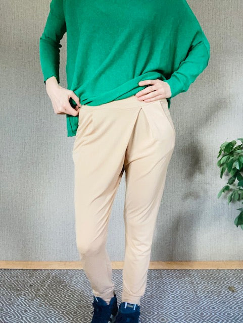 Comfortable trousers in nude