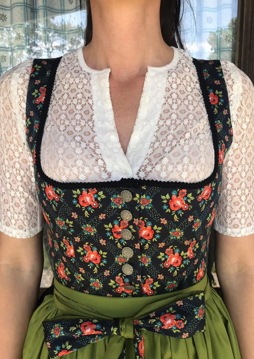 Schwarzes Dirndl mit bedruckten Blumen 