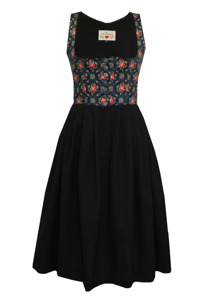 Dirndl mit schwarzen Rock und außergewöhnlichen Dirndloberteil. 