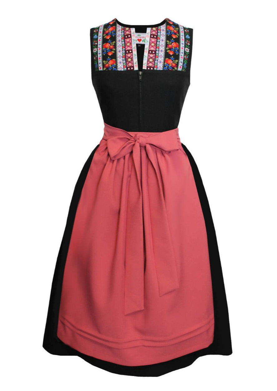 Ausgefallenes Vintage-Stil Dirndl mit Retro-Borten im Herzblut Shop.