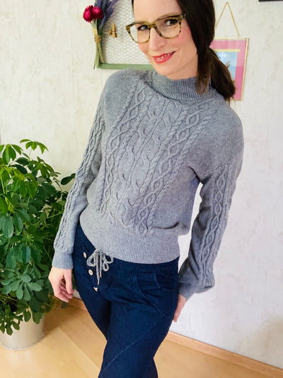 Gray cable knit sweater
